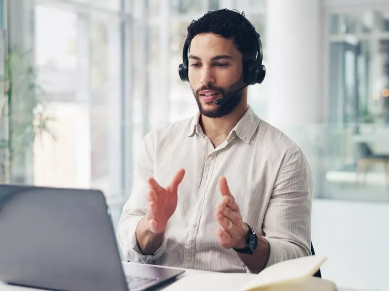 Freelancer to Take Your Online Class working on a laptop
